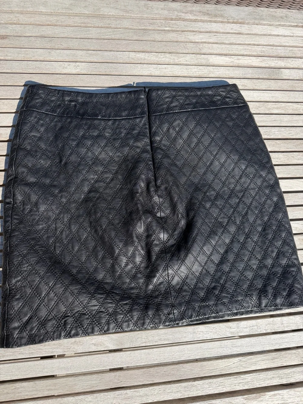 Black Quilted Mini Skirt with Decorative Button Pockets
